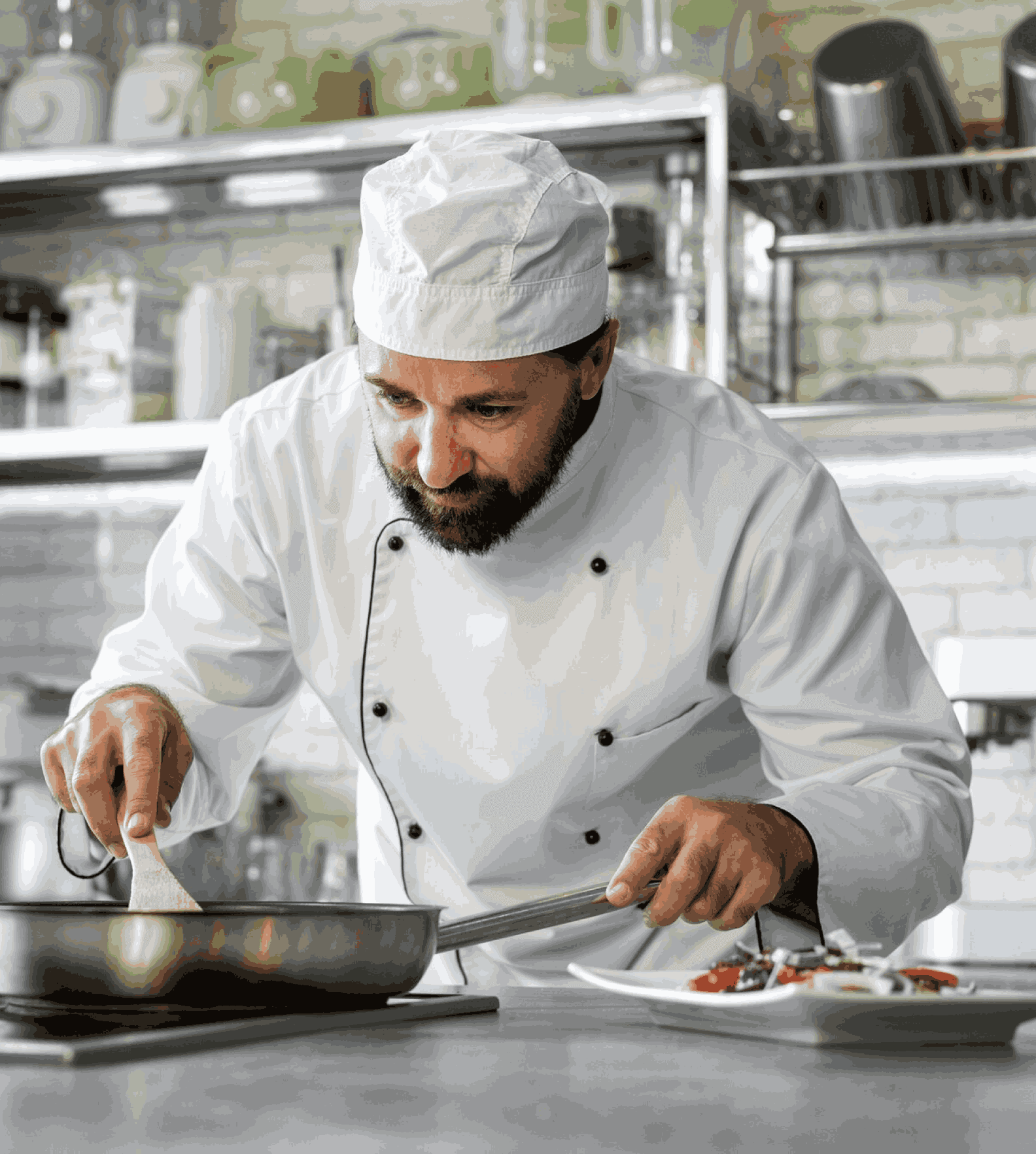 Rayleigh’s head chef holding a fresh burger