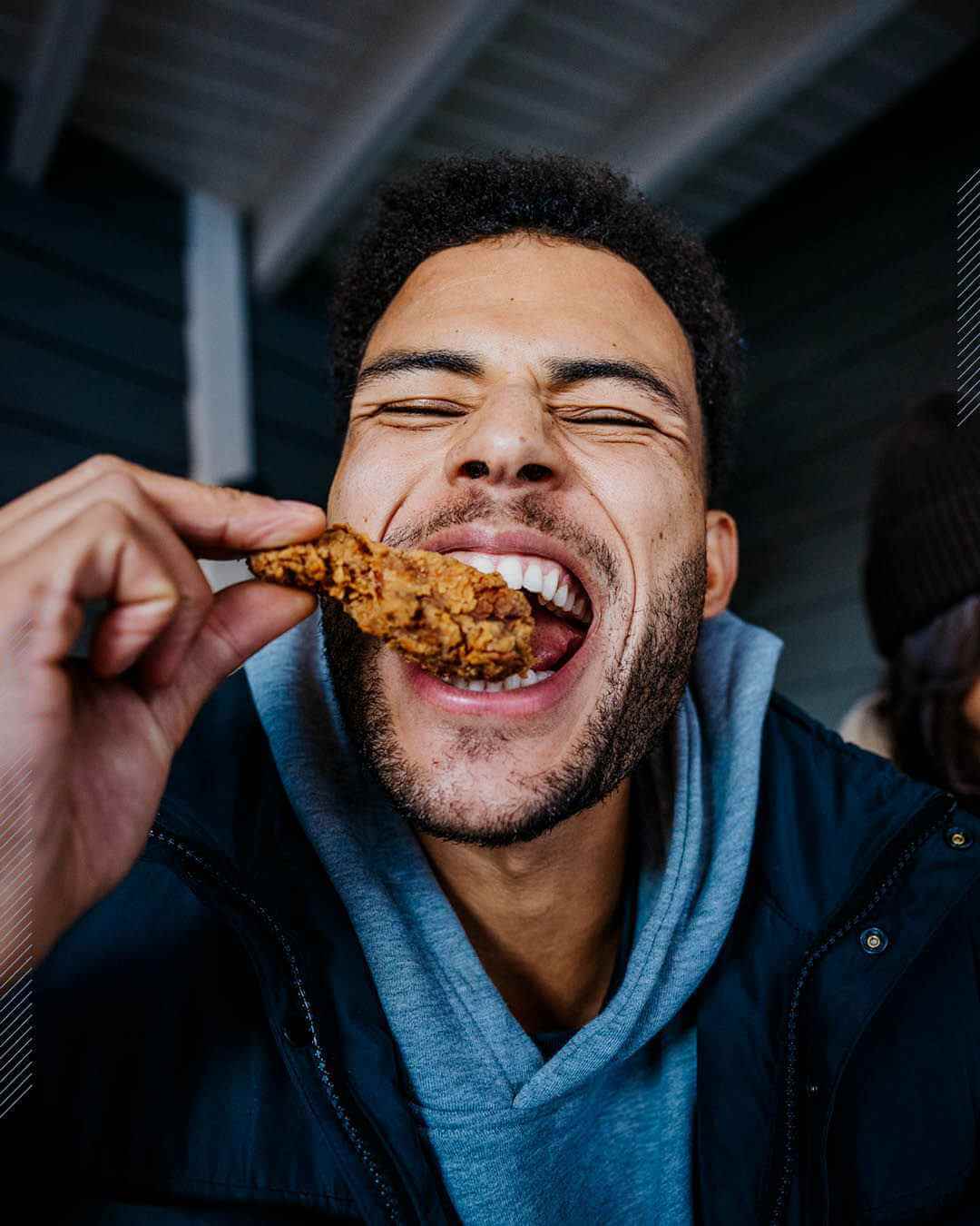 Guest enjoying a burger at Rayleigh’s