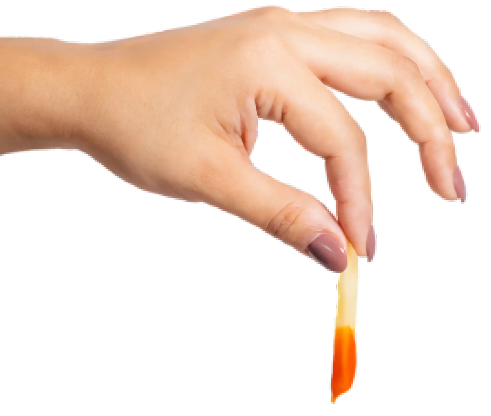 Hand holding a chicken strip with fries