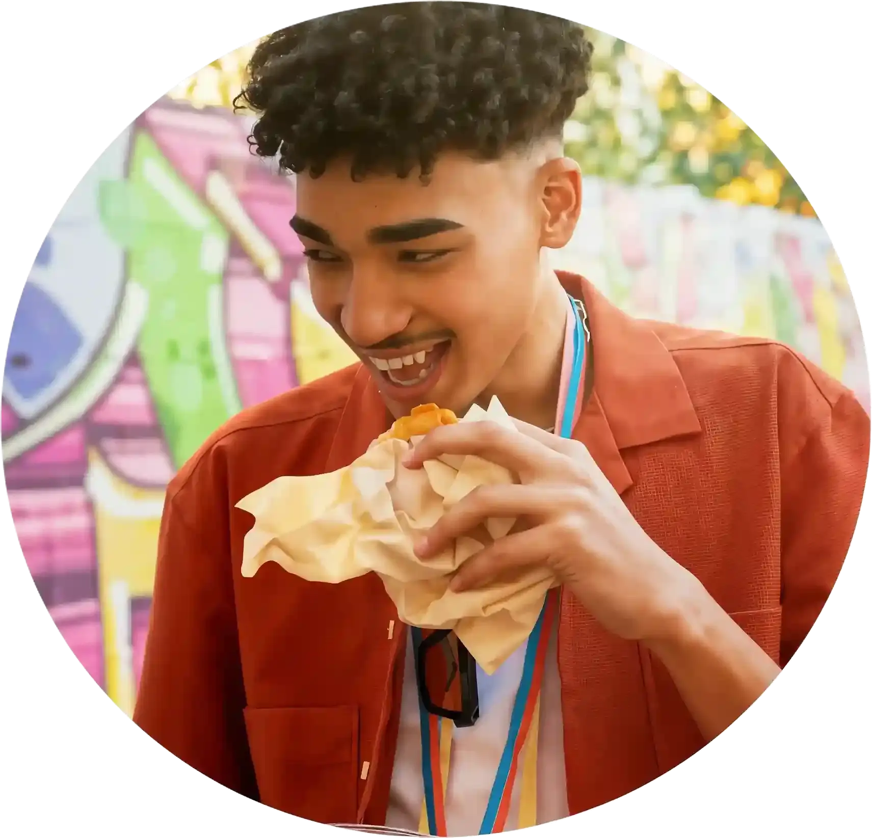 Guest eating a RAYLEIGH'S chicken burger